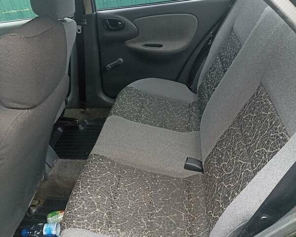 Чорний ЗАЗ Ланос, об'ємом двигуна 1.39 л та пробігом 237 тис. км за 2050 $, фото 5 на Automoto.ua