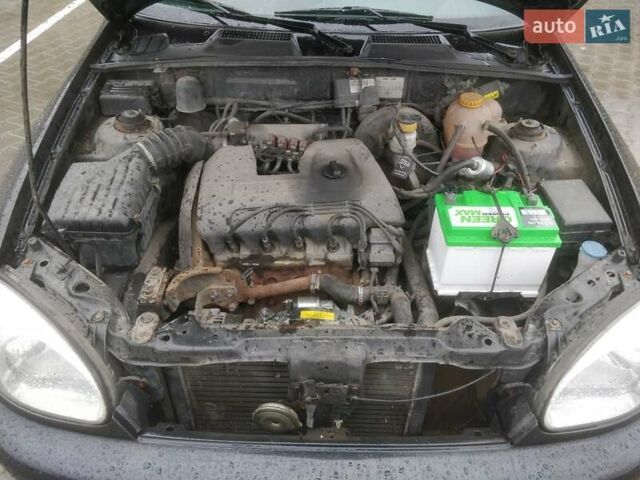 Черный ЗАЗ Ланос, объемом двигателя 1.39 л и пробегом 167 тыс. км за 2500 $, фото 13 на Automoto.ua