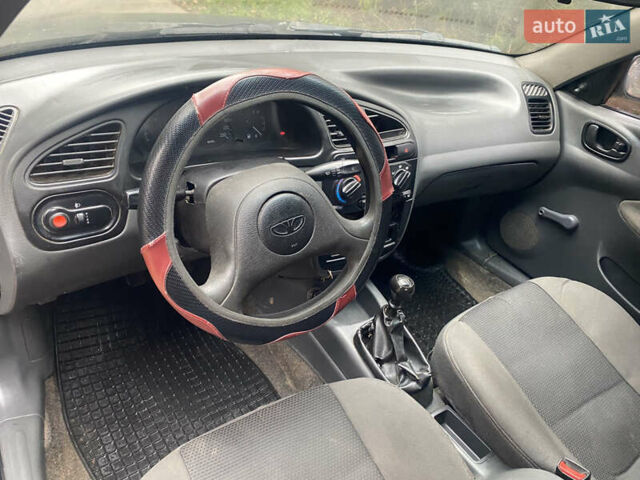 Чорний ЗАЗ Ланос, об'ємом двигуна 1.4 л та пробігом 325 тис. км за 1200 $, фото 6 на Automoto.ua