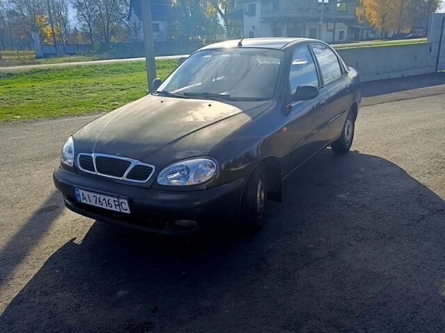 Чорний ЗАЗ Ланос, об'ємом двигуна 1.5 л та пробігом 313 тис. км за 1650 $, фото 1 на Automoto.ua