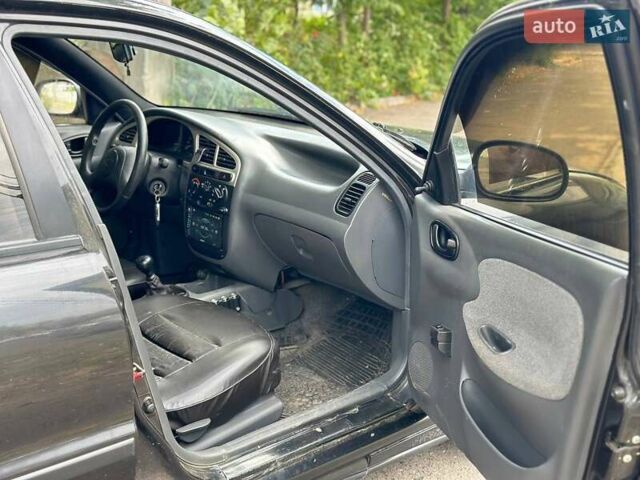 Черный ЗАЗ Ланос, объемом двигателя 1.39 л и пробегом 187 тыс. км за 2499 $, фото 13 на Automoto.ua