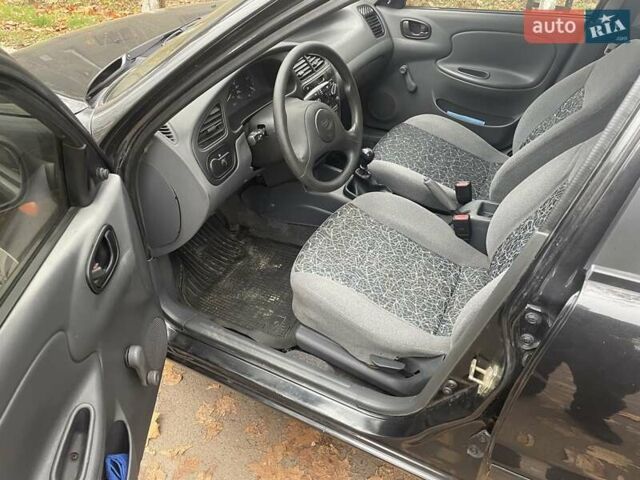 Черный ЗАЗ Ланос, объемом двигателя 1.6 л и пробегом 170 тыс. км за 2400 $, фото 16 на Automoto.ua