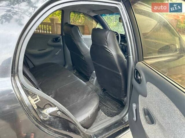 Черный ЗАЗ Ланос, объемом двигателя 1.39 л и пробегом 187 тыс. км за 2499 $, фото 12 на Automoto.ua
