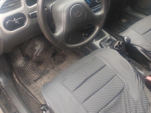 Чорний ЗАЗ Ланос, об'ємом двигуна 1.3 л та пробігом 226 тис. км за 1800 $, фото 5 на Automoto.ua