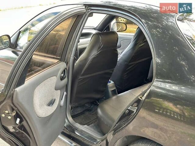 Черный ЗАЗ Ланос, объемом двигателя 1.39 л и пробегом 187 тыс. км за 2499 $, фото 8 на Automoto.ua