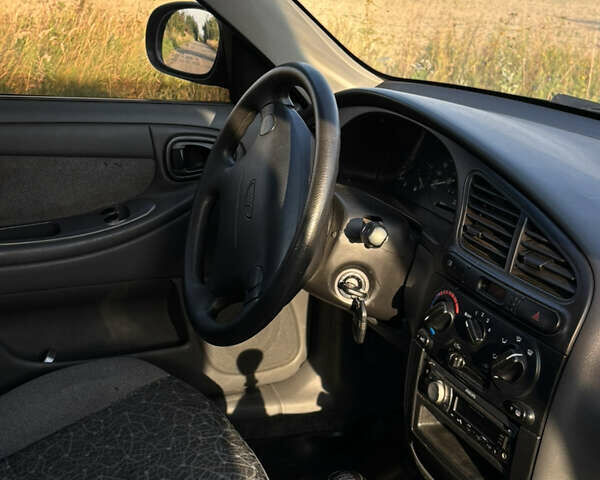 Чорний ЗАЗ Ланос, об'ємом двигуна 1.5 л та пробігом 88 тис. км за 2600 $, фото 11 на Automoto.ua