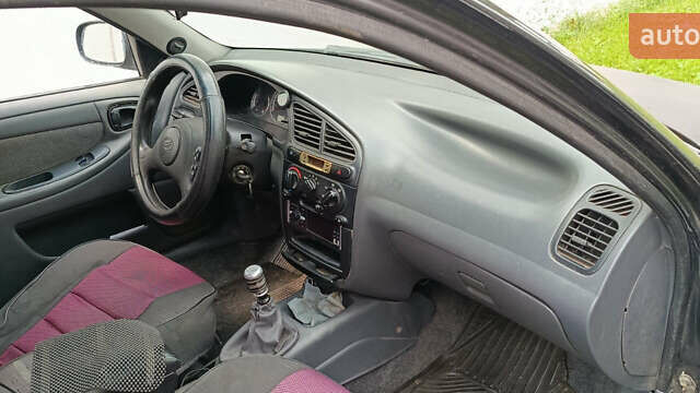 Черный ЗАЗ Ланос, объемом двигателя 1.5 л и пробегом 200 тыс. км за 2000 $, фото 1 на Automoto.ua