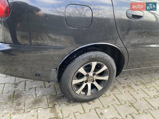 Черный ЗАЗ Ланос, объемом двигателя 1.35 л и пробегом 170 тыс. км за 2100 $, фото 5 на Automoto.ua