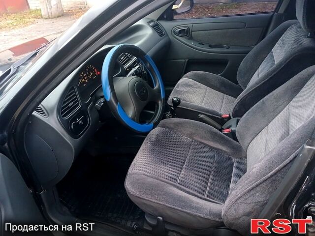 Черный ЗАЗ Ланос, объемом двигателя 1.5 л и пробегом 240 тыс. км за 3000 $, фото 6 на Automoto.ua