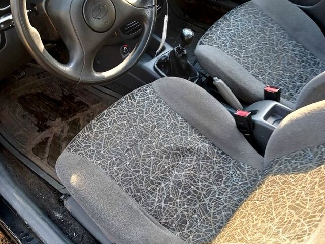 Чорний ЗАЗ Ланос, об'ємом двигуна 1.5 л та пробігом 124 тис. км за 3100 $, фото 5 на Automoto.ua