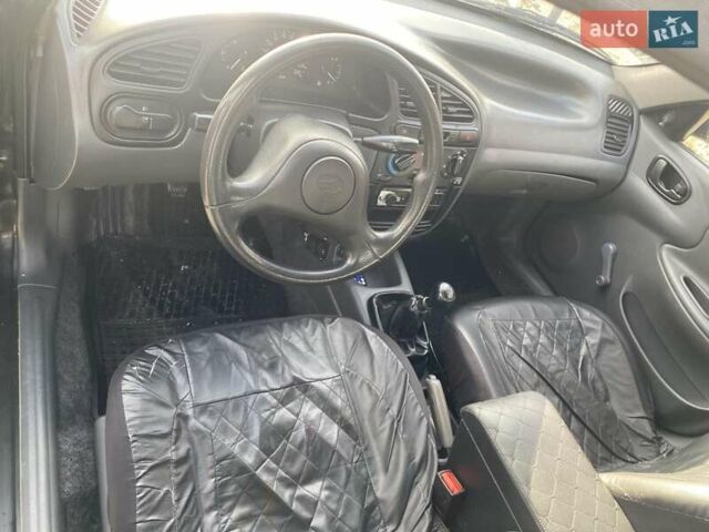 Черный ЗАЗ Ланос, объемом двигателя 1.35 л и пробегом 170 тыс. км за 2100 $, фото 6 на Automoto.ua