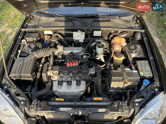 Чорний ЗАЗ Ланос, об'ємом двигуна 1.5 л та пробігом 88 тис. км за 2600 $, фото 17 на Automoto.ua