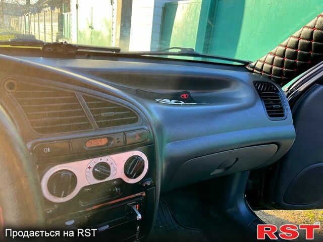 Чорний ЗАЗ Ланос, об'ємом двигуна 16 л та пробігом 130 тис. км за 2800 $, фото 9 на Automoto.ua