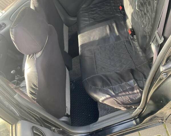 Черный ЗАЗ Ланос, объемом двигателя 1.35 л и пробегом 170 тыс. км за 2100 $, фото 7 на Automoto.ua