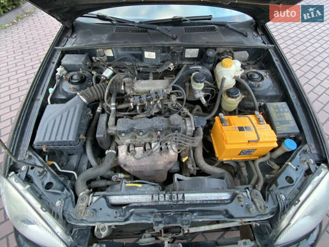 Черный ЗАЗ Ланос, объемом двигателя 1.5 л и пробегом 197 тыс. км за 2999 $, фото 28 на Automoto.ua