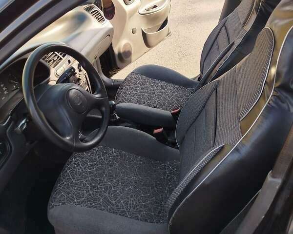 Черный ЗАЗ Ланос, объемом двигателя 1.5 л и пробегом 110 тыс. км за 2500 $, фото 4 на Automoto.ua