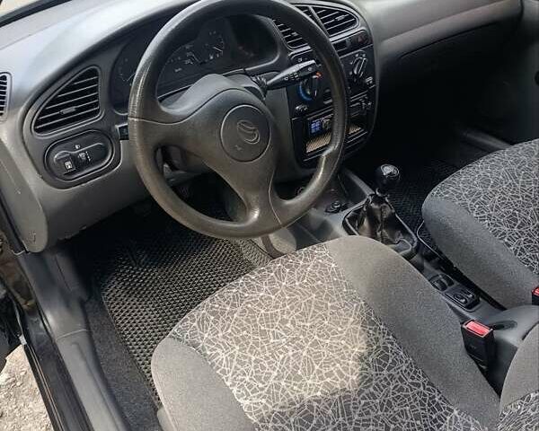 Чорний ЗАЗ Ланос, об'ємом двигуна 1.5 л та пробігом 243 тис. км за 3800 $, фото 12 на Automoto.ua