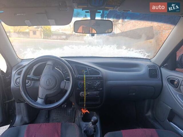 Черный ЗАЗ Ланос, объемом двигателя 1.5 л и пробегом 350 тыс. км за 1900 $, фото 7 на Automoto.ua