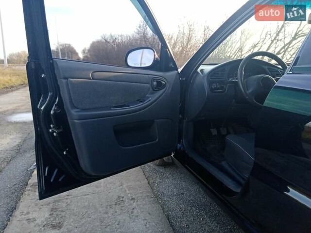 Черный ЗАЗ Ланос, объемом двигателя 1.5 л и пробегом 106 тыс. км за 3200 $, фото 5 на Automoto.ua