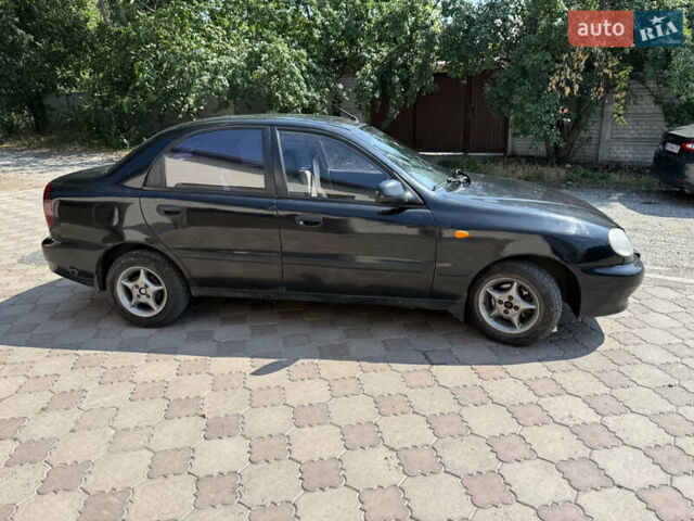 Чорний ЗАЗ Ланос, об'ємом двигуна 1.5 л та пробігом 333 тис. км за 1875 $, фото 3 на Automoto.ua