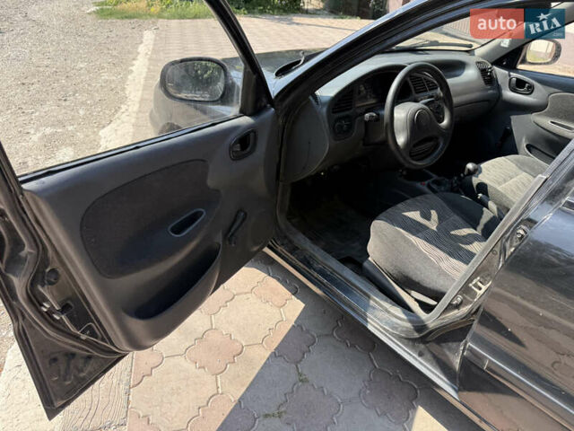 Чорний ЗАЗ Ланос, об'ємом двигуна 1.5 л та пробігом 333 тис. км за 1875 $, фото 9 на Automoto.ua