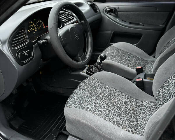 Черный ЗАЗ Ланос, объемом двигателя 1.5 л и пробегом 175 тыс. км за 2650 $, фото 13 на Automoto.ua