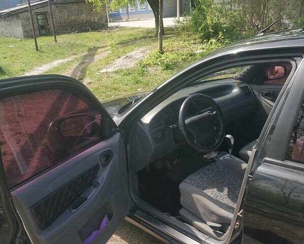 Черный ЗАЗ Ланос, объемом двигателя 1.4 л и пробегом 184 тыс. км за 4000 $, фото 7 на Automoto.ua