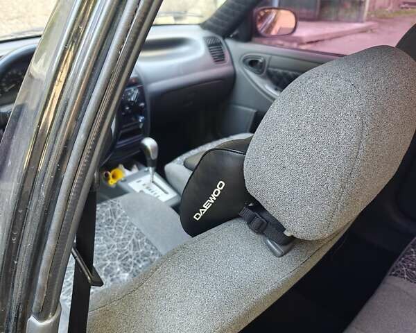 Черный ЗАЗ Ланос, объемом двигателя 1.4 л и пробегом 184 тыс. км за 4000 $, фото 8 на Automoto.ua