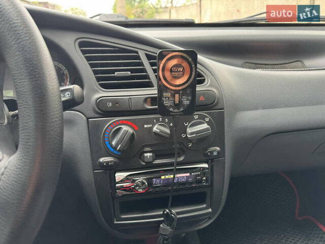 Красный ЗАЗ Ланос, объемом двигателя 1.5 л и пробегом 110 тыс. км за 4250 $, фото 8 на Automoto.ua