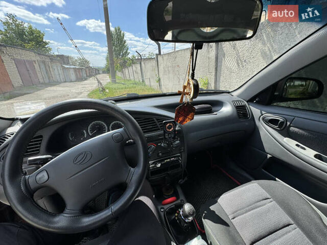 Красный ЗАЗ Ланос, объемом двигателя 1.5 л и пробегом 110 тыс. км за 4250 $, фото 10 на Automoto.ua