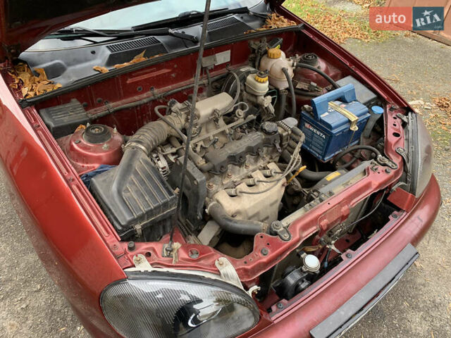 Красный ЗАЗ Ланос, объемом двигателя 1.5 л и пробегом 370 тыс. км за 2550 $, фото 12 на Automoto.ua
