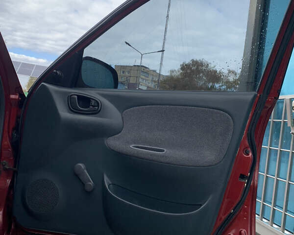 Красный ЗАЗ Ланос, объемом двигателя 1.5 л и пробегом 370 тыс. км за 2550 $, фото 7 на Automoto.ua