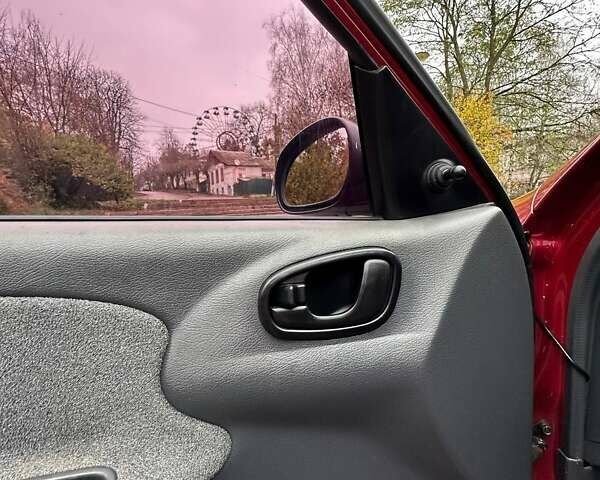 Красный ЗАЗ Ланос, объемом двигателя 1.3 л и пробегом 192 тыс. км за 2300 $, фото 22 на Automoto.ua