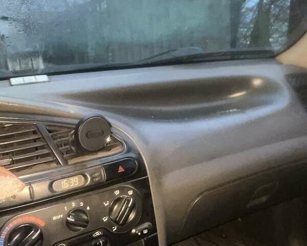 Червоний ЗАЗ Ланос, об'ємом двигуна 1.4 л та пробігом 205 тис. км за 1800 $, фото 3 на Automoto.ua