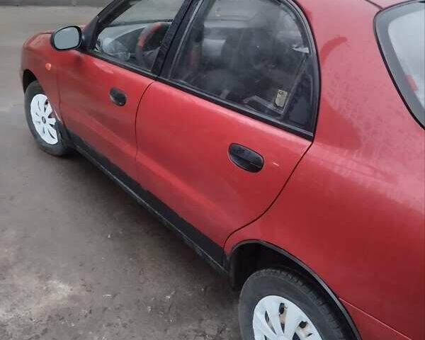 Красный ЗАЗ Ланос, объемом двигателя 1.4 л и пробегом 198 тыс. км за 1750 $, фото 5 на Automoto.ua