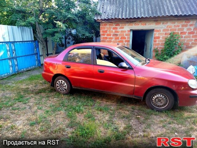 Красный ЗАЗ Ланос, объемом двигателя 1.4 л и пробегом 244 тыс. км за 2650 $, фото 1 на Automoto.ua