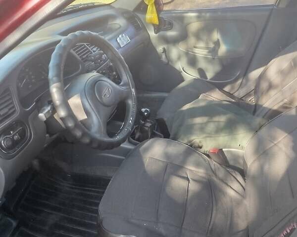 Червоний ЗАЗ Ланос, об'ємом двигуна 1.39 л та пробігом 227 тис. км за 1500 $, фото 5 на Automoto.ua