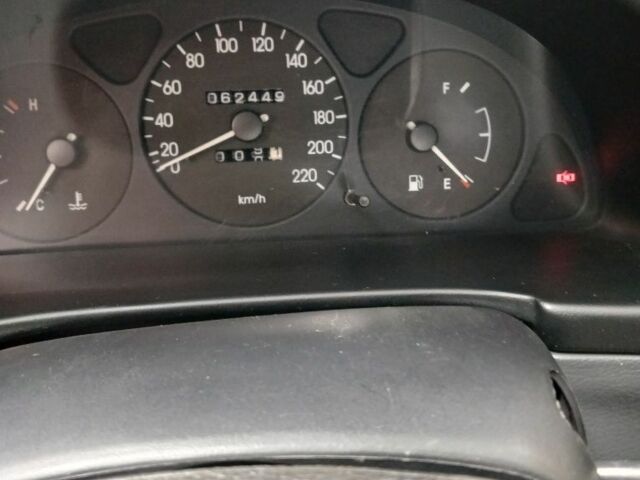 Красный ЗАЗ Ланос, объемом двигателя 1.4 л и пробегом 65 тыс. км за 3700 $, фото 6 на Automoto.ua