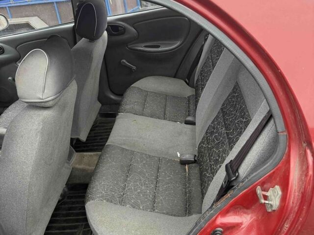 Красный ЗАЗ Ланос, объемом двигателя 1.4 л и пробегом 270 тыс. км за 1150 $, фото 6 на Automoto.ua