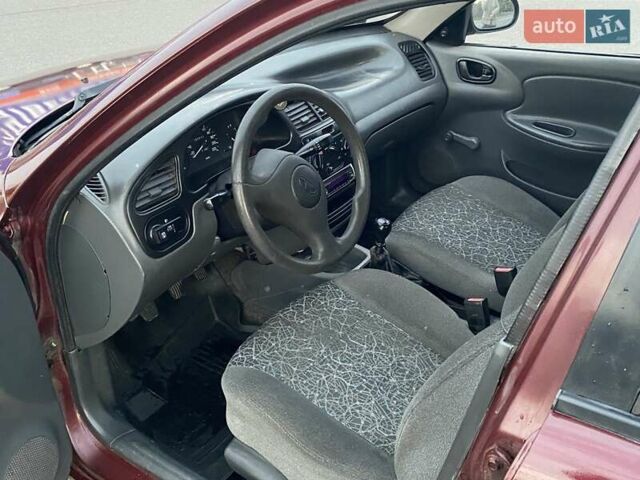 Червоний ЗАЗ Ланос, об'ємом двигуна 1.39 л та пробігом 226 тис. км за 2200 $, фото 11 на Automoto.ua