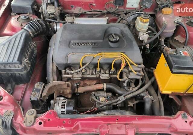 Червоний ЗАЗ Ланос, об'ємом двигуна 1.4 л та пробігом 212 тис. км за 2300 $, фото 6 на Automoto.ua