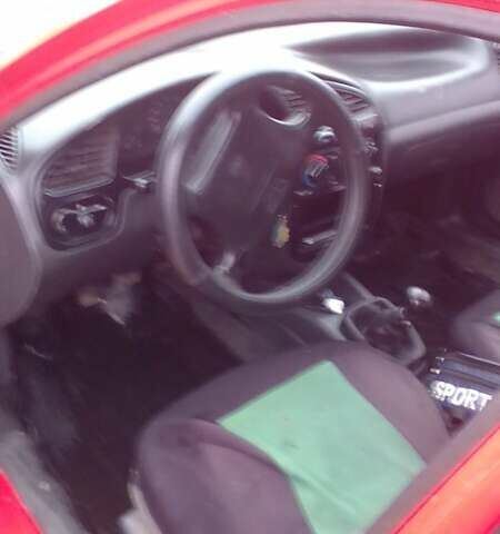 Красный ЗАЗ Ланос, объемом двигателя 1.3 л и пробегом 200 тыс. км за 1900 $, фото 8 на Automoto.ua