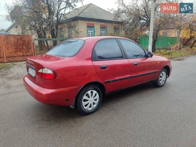 Красный ЗАЗ Ланос, объемом двигателя 1.39 л и пробегом 254 тыс. км за 1500 $, фото 3 на Automoto.ua