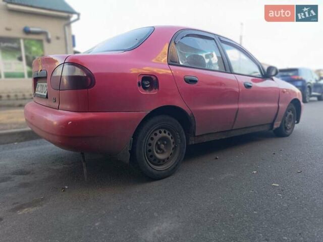 Червоний ЗАЗ Ланос, об'ємом двигуна 1.39 л та пробігом 250 тис. км за 850 $, фото 3 на Automoto.ua