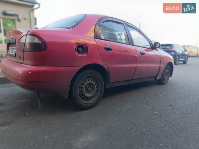 Червоний ЗАЗ Ланос, об'ємом двигуна 1.39 л та пробігом 250 тис. км за 850 $, фото 5 на Automoto.ua