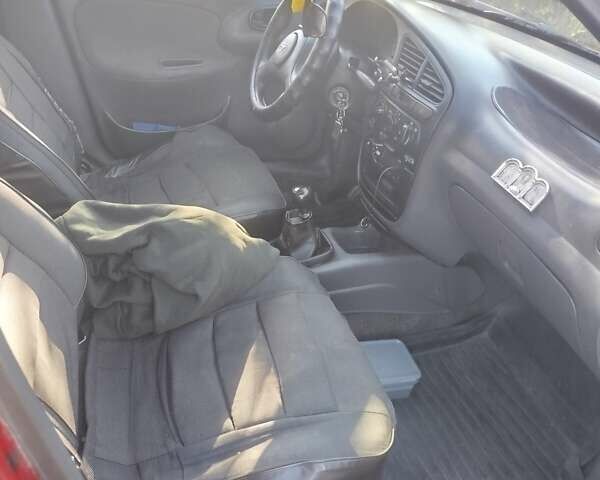 Червоний ЗАЗ Ланос, об'ємом двигуна 1.39 л та пробігом 227 тис. км за 1500 $, фото 7 на Automoto.ua