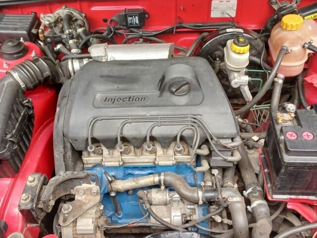 Красный ЗАЗ Ланос, объемом двигателя 1.4 л и пробегом 65 тыс. км за 3700 $, фото 7 на Automoto.ua