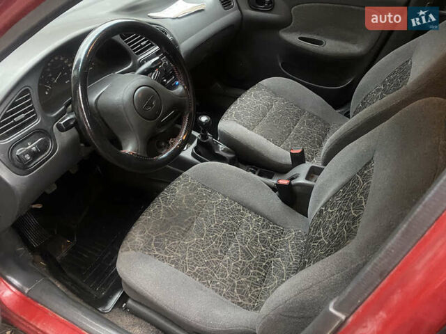 Красный ЗАЗ Ланос, объемом двигателя 1.5 л и пробегом 200 тыс. км за 1950 $, фото 15 на Automoto.ua