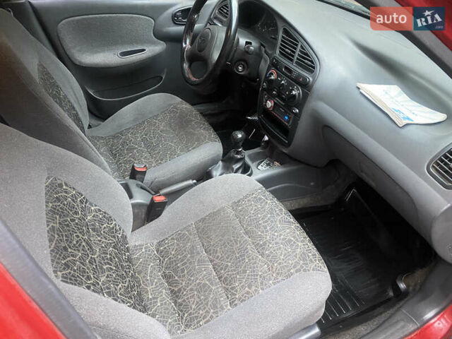 Красный ЗАЗ Ланос, объемом двигателя 1.5 л и пробегом 200 тыс. км за 1950 $, фото 12 на Automoto.ua