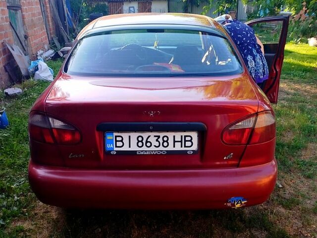 Красный ЗАЗ Ланос, объемом двигателя 1.4 л и пробегом 244 тыс. км за 2650 $, фото 4 на Automoto.ua